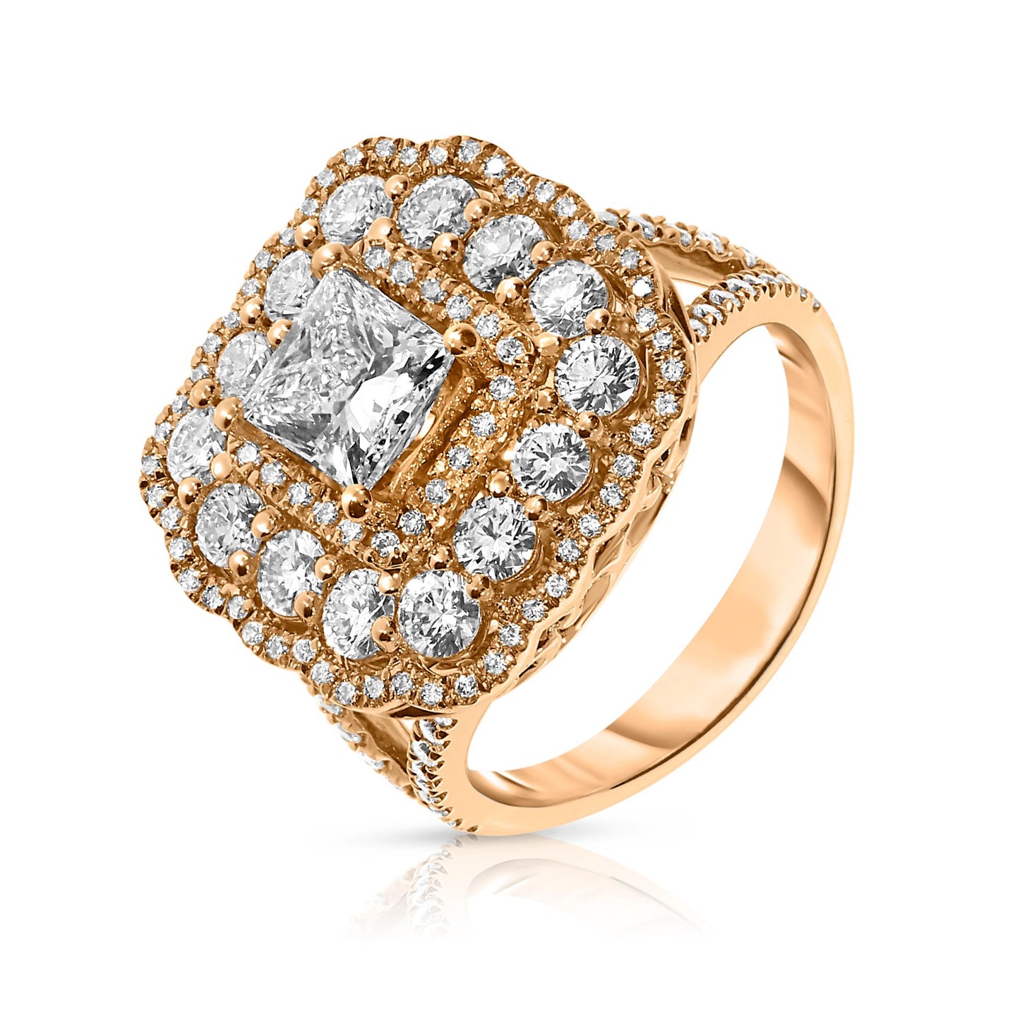 Embrace celestial beauty with the Eclipse of Radiance gold halo ring, featuring a captivating princess-cut diamond surrounded by a halo of sparkling gems. Perfect for engagements, anniversaries, or celebrating life's milestones.