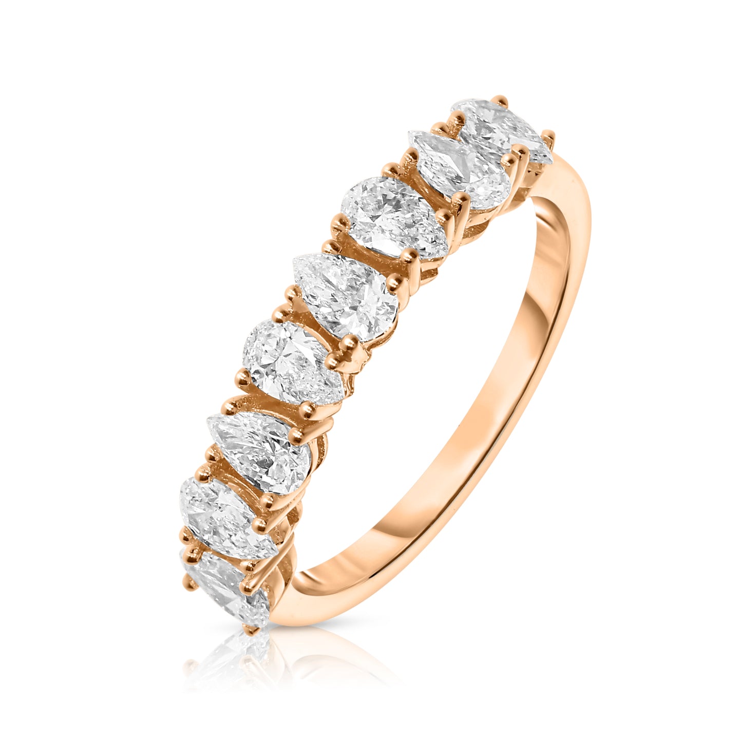 Capture endless elegance with The Celestial Journey, a gold eternity ring set with pear-cut diamonds. Available in 14K or 18K gold. Ideal for anniversaries or lifelong vows.
