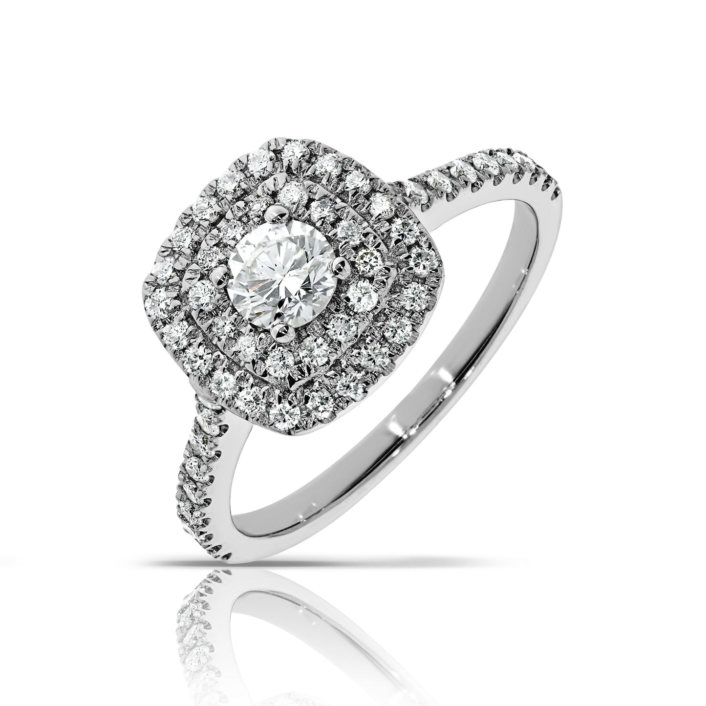 Capture the ethereal beauty of the cosmos with the "Celestial Radiance" halo ring. Crafted in gleaming gold, this exquisite piece features a stunning round-cut diamond at its heart, encircled by a halo that magnifies its brilliance, much like stars twinkling in the vast night sky. The gold setting adds modern elegance, perfect for symbolizing everlasting love or celebrating life's precious moments. Pairs beautifully with our "Celeste" earrings for a complete celestial ensemble.