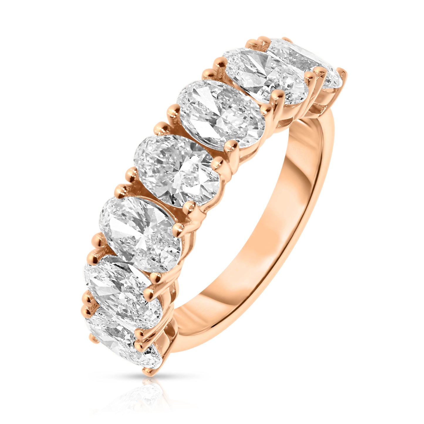 Embrace the timeless allure of love with our Gold Eternity Ring - “Eternal Constellation.” This exquisite piece showcases a seamless circle of stunning oval-cut diamonds, their celestial brilliance echoing the harmonious order of the universe. Perfect for celebrating a significant milestone or as a token of eternal commitment.