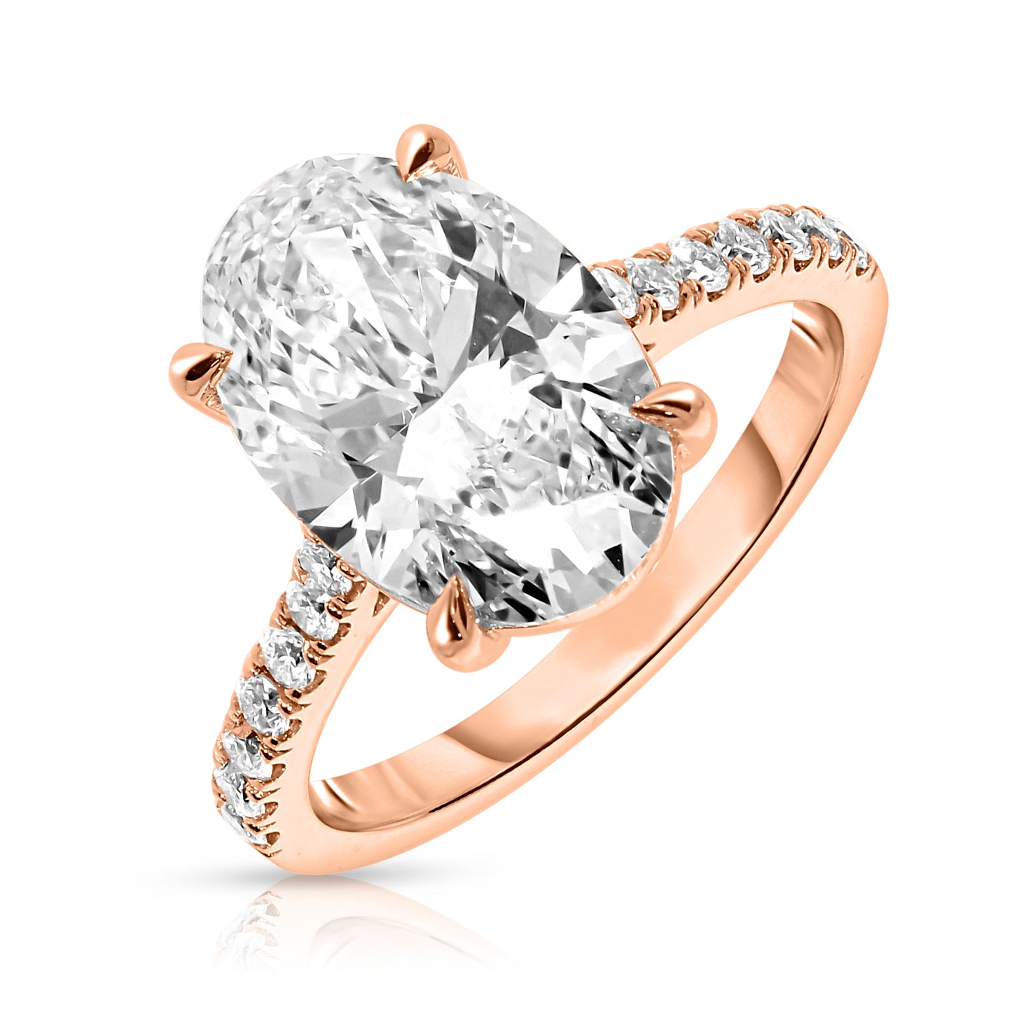 Embrace the ethereal charm of celestial wonders with the 'Celestial Promise.' This Gold sidestone ring is crowned by an enchanting oval diamond, reflecting the timeless beauty of a radiant celestial body. Encircled by sidestones that sparkle like steadfast constellations, this piece promises a lifetime of devotion and heartfelt memories. Ideal for engagements or celebrating an undying commitment, this ring is a testament to love that transcends the cosmos.