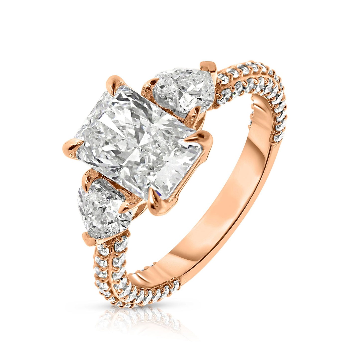 Discover "The Celestial Triad," an exquisite ring with two sidestone emerald-cut diamonds, symbolizing cosmic harmony. Crafted from Gold, it captures light uniquely. Ideal for celebrating unions or personal milestones with elegance.