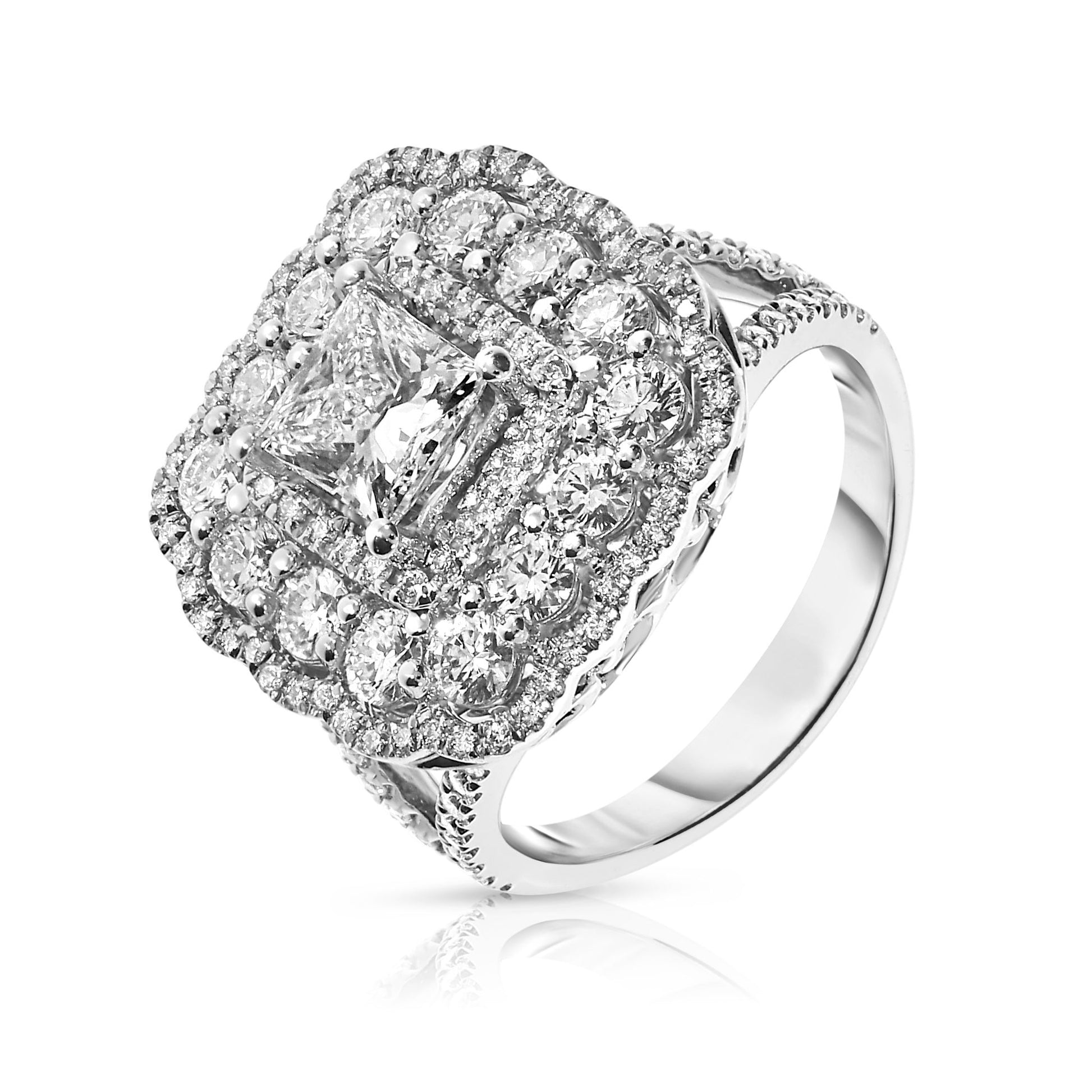 Embrace celestial beauty with the Eclipse of Radiance gold halo ring, featuring a captivating princess-cut diamond surrounded by a halo of sparkling gems. Perfect for engagements, anniversaries, or celebrating life's milestones.