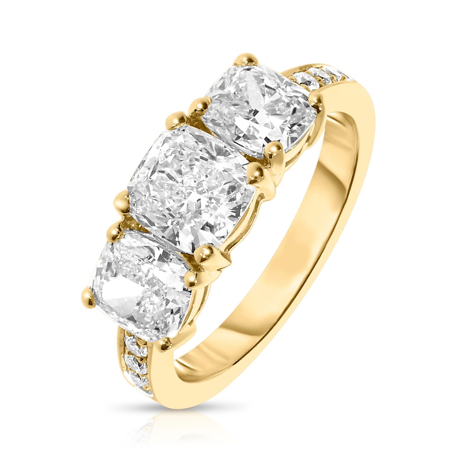 Discover the mystical allure of the Celestial Trio Gold Sidestone Ring. Featuring three cushion-cut diamonds that symbolize the past, present, and future, this ring epitomizes eternal love. A perfect choice for engagements, anniversaries, or commemorating significant life moments.