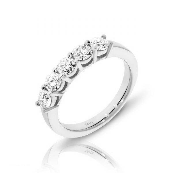 Crafted from gold, the 'Circle of Luminescence' eternity ring symbolizes lasting love and unity. Adorned with diamonds, it represents eternal light and steadfast promise, perfect for anniversaries or significant milestones.