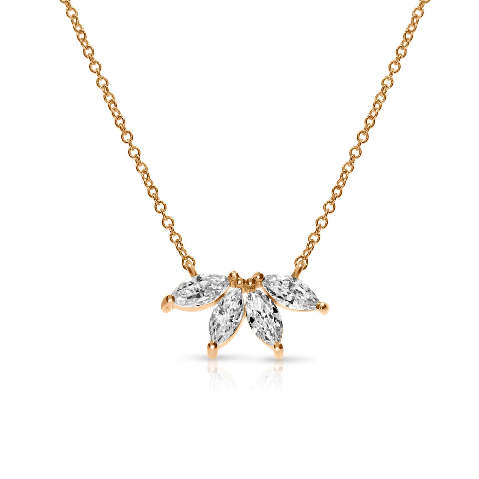 Embodying the ethereal grace of angelic flight, this gold necklace presents a stunning array of marquise-cut diamonds meticulously arranged to evoke the elegant form of wings, echoing the serene majesty of the heavens.