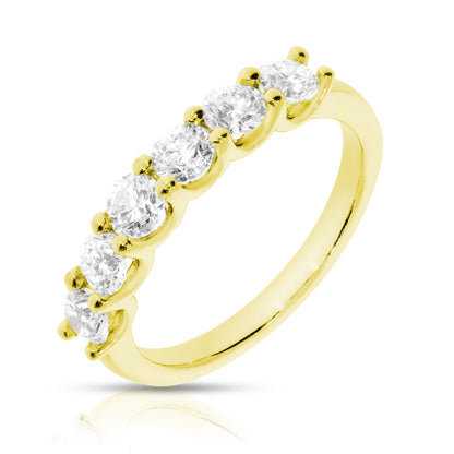 Embrace the everlasting bond of love with the 'Circle of Light.' This eternity ring in gold features a continuous band of round-cut diamonds, perfect for anniversaries or timeless connections.