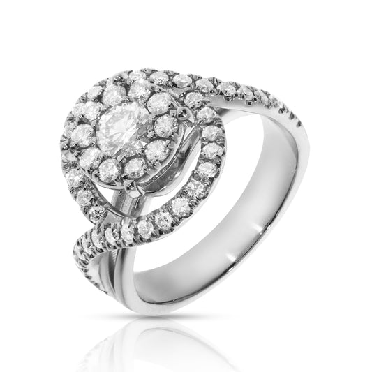 Discover the Ethereal Halo ring in Gold, featuring a luminous round-cut diamond encircled by smaller diamonds, perfect for engagements.