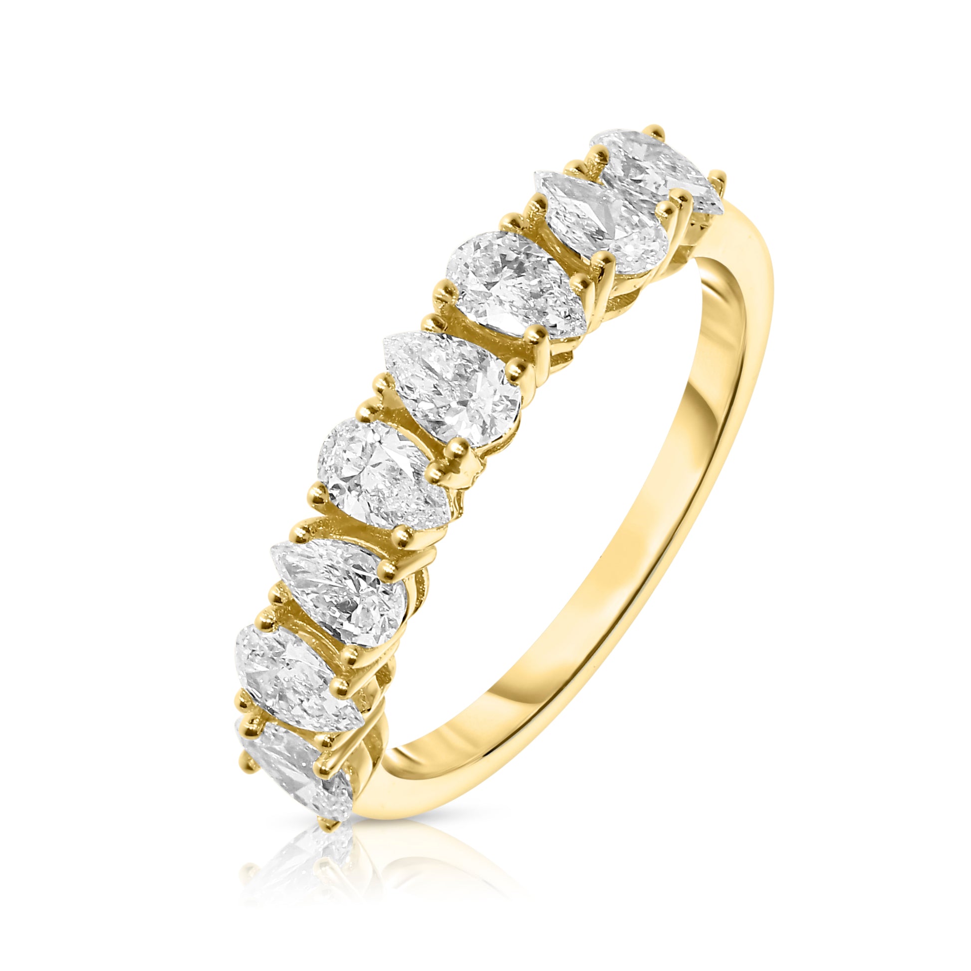 Capture endless elegance with The Celestial Journey, a gold eternity ring set with pear-cut diamonds. Available in 14K or 18K gold. Ideal for anniversaries or lifelong vows.