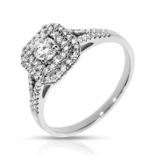 The "Eternal Halo" ring celebrates endless devotion with a gold band and a dazzling round-cut diamond, surrounded by a halo of shimmering stones. This elegant design is perfect as an engagement ring or a token of self-admiration.