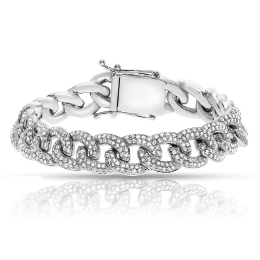 Capture the power and brilliance of the night sky with our "Orion's Might" men's diamond bracelet. Inspired by the legendary hunter Orion, this bracelet features a striking design of intertwined links that echo the famous constellation's belt. Crafted from luxurious silver, each link is set with shimmering round-cut diamonds, mirroring the stars' sparkle. A statement of strength and elegance, ideal for marking milestones or celebrating triumphs.