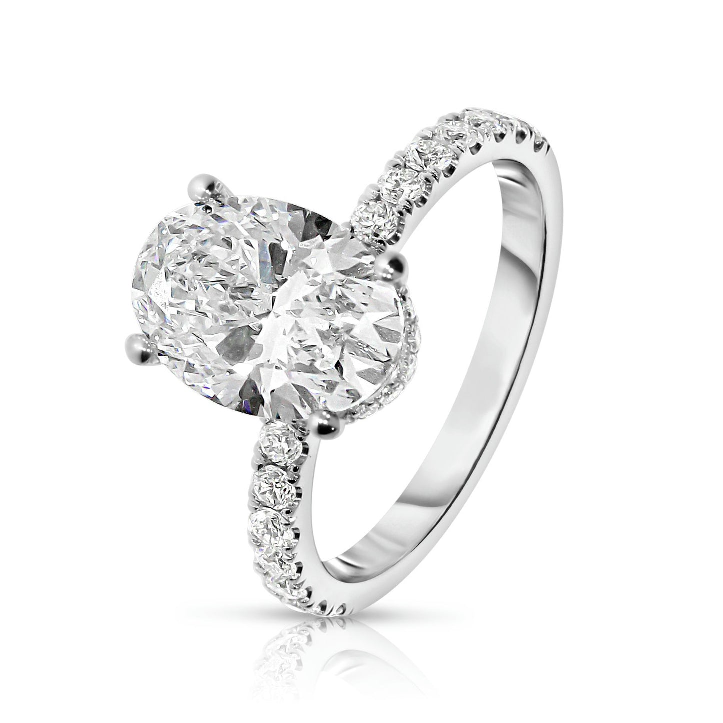 Sidestone Ring in White Gold with Oval Diamond – Eclipse Allure |