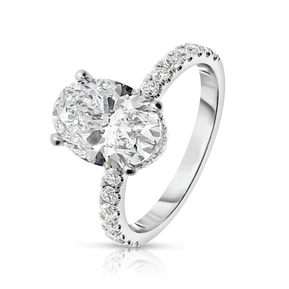 Sidestone Ring in White Gold with Oval Diamond – Eclipse Allure |