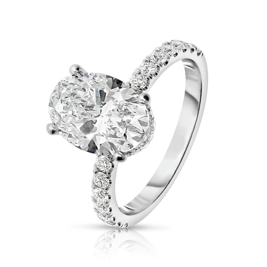 Sidestone Ring in White Gold with Oval Diamond – Eclipse Allure |
