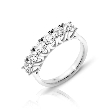 Crafted in luminous gold, the "Eternal Luminosity" eternity ring captures celestial grace. Round-cut diamonds set to spark stars, symbolizing endless love. Perfect for weddings or eternal devotion. Designed to be cherished.