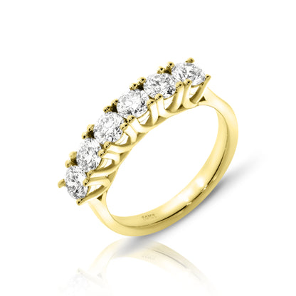 Crafted in luminous gold, the "Eternal Luminosity" eternity ring captures celestial grace. Round-cut diamonds set to spark stars, symbolizing endless love. Perfect for weddings or eternal devotion. Designed to be cherished.