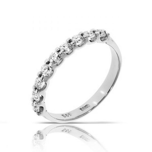 Reflecting the infinite beauty of enduring love, the 'Eternal Radiance' Gold eternity ring is adorned with brilliant round-cut diamonds, symbolizing an unbroken promise of devotion. Perfect for anniversaries or vows of infinite love.