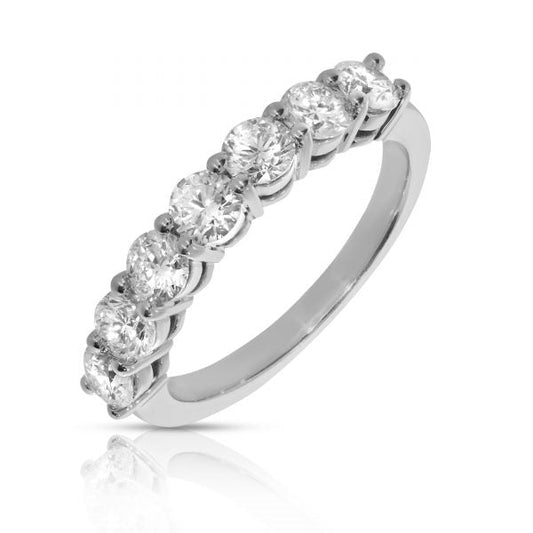 Celebrate the eternal beauty of the cosmos with the "Circle of Luminescence," an eternity ring in gold featuring a continuous row of radiant diamonds. Symbolizing infinite love and unyielding commitment, it's perfect for anniversaries, milestones, or personal triumphs.
