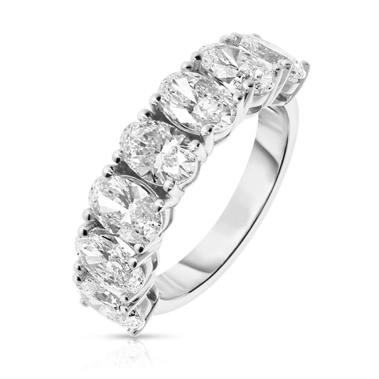 Embrace the timeless allure of love with our Gold Eternity Ring - “Eternal Constellation.” This exquisite piece showcases a seamless circle of stunning oval-cut diamonds, their celestial brilliance echoing the harmonious order of the universe. Perfect for celebrating a significant milestone or as a token of eternal commitment.