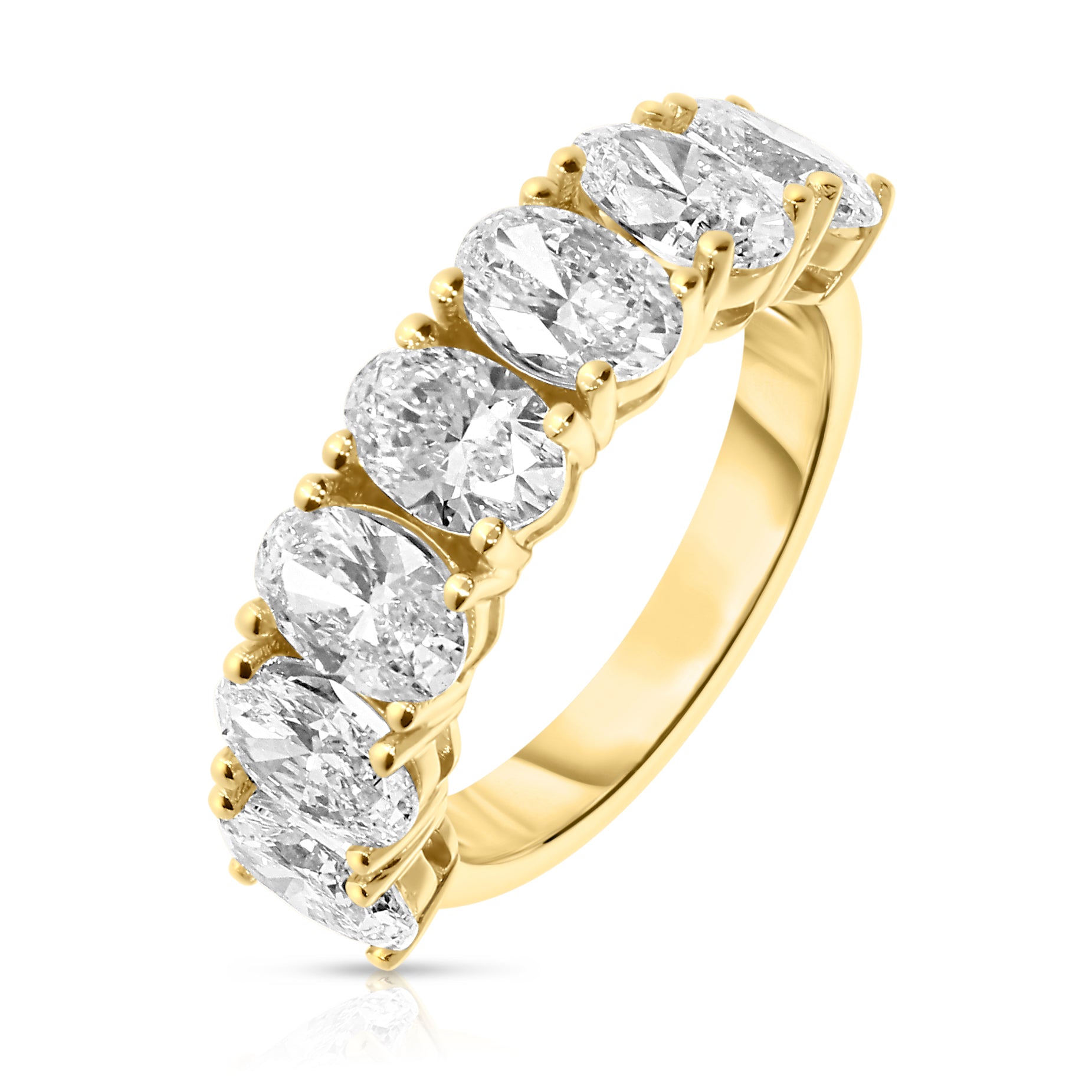 Embrace the timeless allure of love with our Gold Eternity Ring - “Eternal Constellation.” This exquisite piece showcases a seamless circle of stunning oval-cut diamonds, their celestial brilliance echoing the harmonious order of the universe. Perfect for celebrating a significant milestone or as a token of eternal commitment.