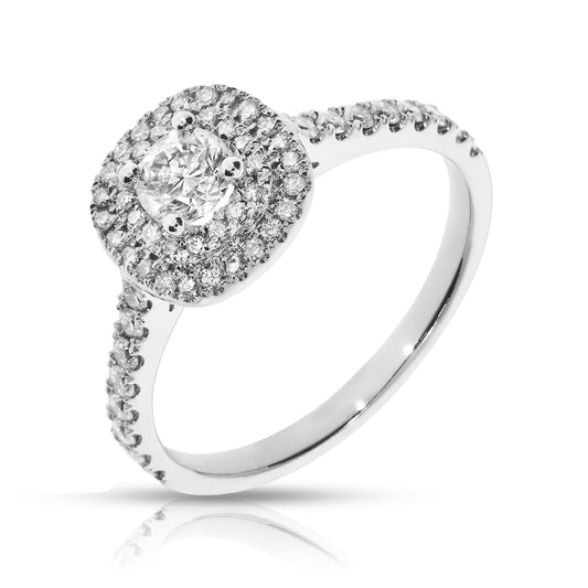 The Celestial Harmonia halo ring captures the ethereal beauty of the cosmos with a radiant round-cut diamond in gold. Perfect for milestone celebrations or expressing enduring love.