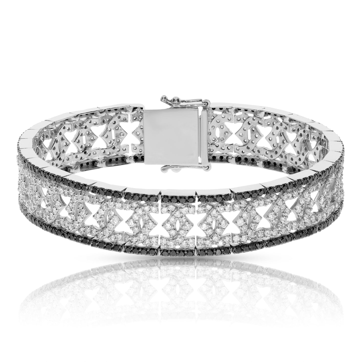 Inspired by the beauty of a lunar eclipse, this stunning silver bracelet, adorned with round-cut black and diamonds, captures the celestial allure. A symbol of harmony and contrast, perfect for significant milestones or as a token of love.